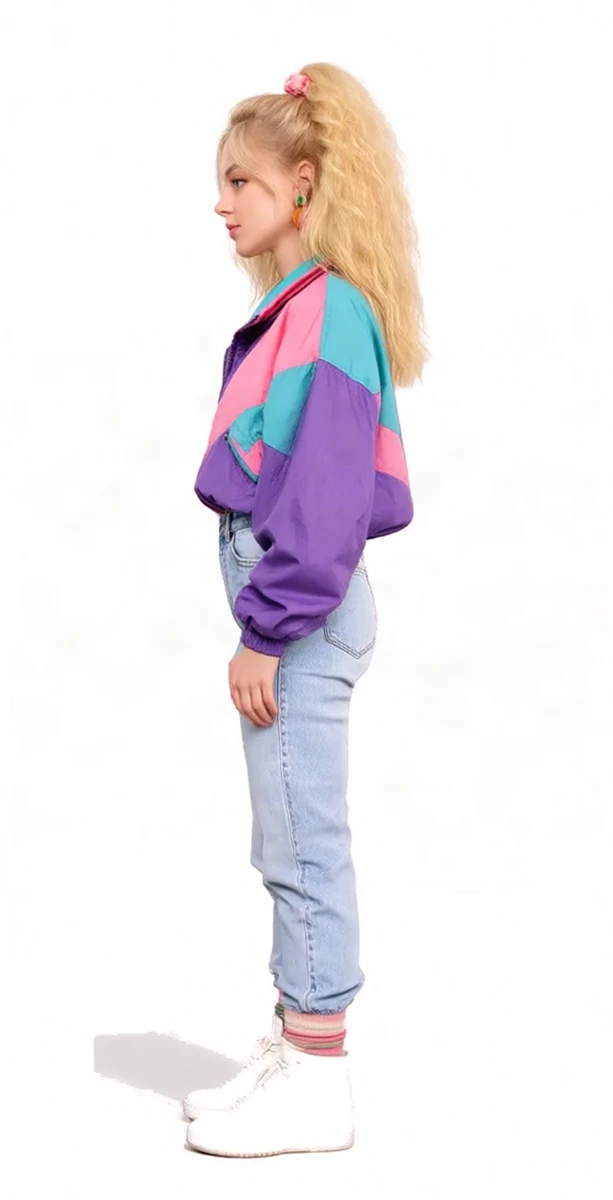 Retro girl right 90°: the girl standing in profile on white, the side of the colour-block jacket and jeans, her ponytail behind her head